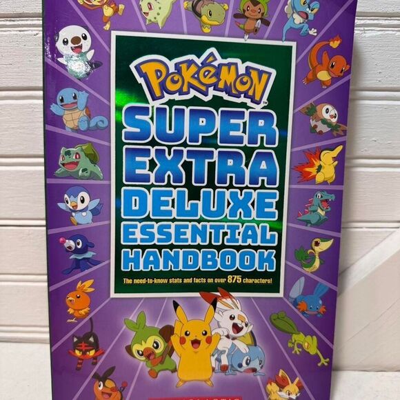 "Pokemon Adventures" and "Pokemon Super Extra Deluxe Essential Handbook" books - Picture 2 of 8